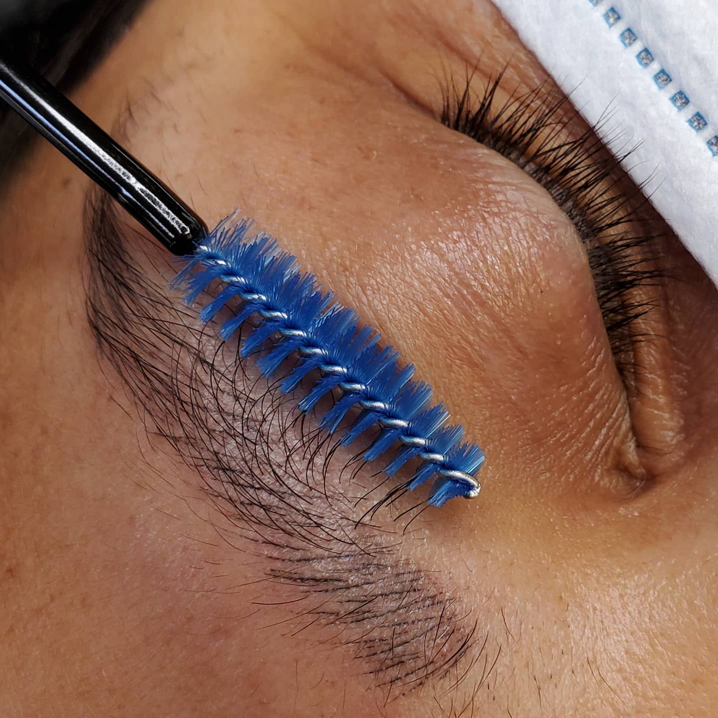 Microbladed brows with brush showing the strokes